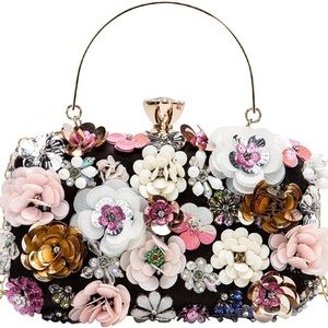 Adorable Flower Handbag. Brand New. Also comes with gold chain shoulder strap.